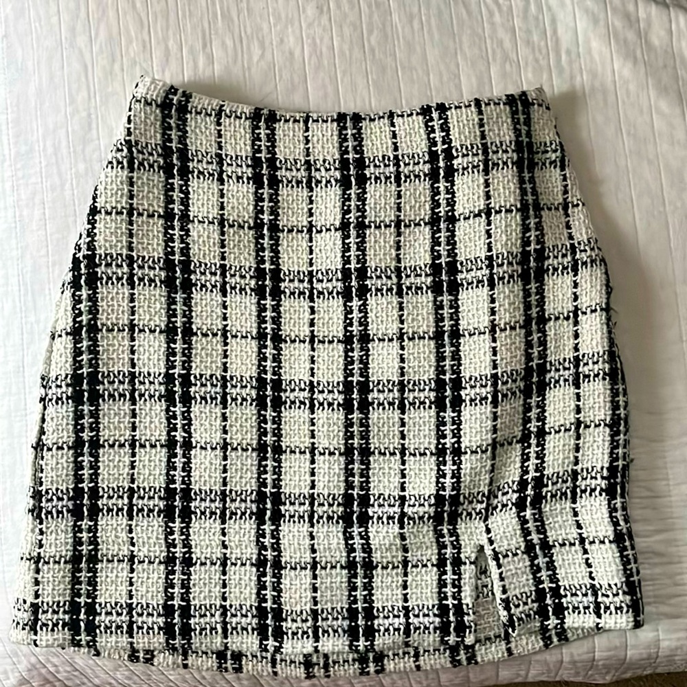 Francesca’s plaid skirt